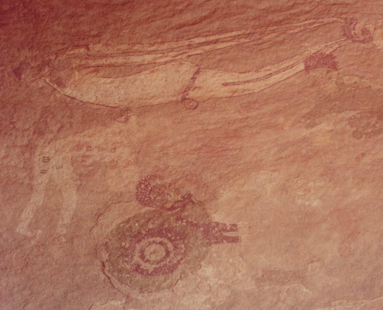 Swimming woman with breasts on her back, Aouenrhet